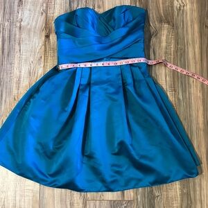 Teal David’s Bridal dress